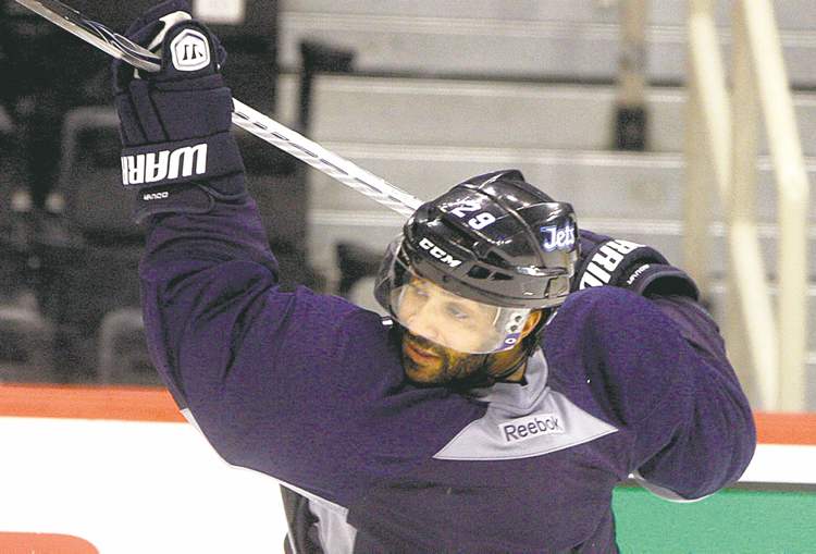 KEN GIGLIOTTI / WINNIPEG FREE PRESS
Johnny Oduya practises with the Winnipeg Jets on Monday, prior to the game against the Edmonton Oilers at the MTS Centre. He was a Chicago Blackhawk soon after.