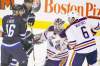 WINNIPEG FREE PRESS
John Woods / Winnipeg Free Press
ALL EYES ON THE PUCK: Jets� Andrew Ladd and Blake Wheeler look on as Edmonton Oilers goaltender Devan Dubnyk stops a first-period shot.