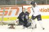 Mike Deal / Winnipeg Free Press
Winnipeg Jets forward Jim Slater goes to the net in front of goaltender Chris Mason during a practice at the MTS Centre on Tuesday.