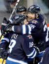 John Woods / The Winnipeg Free Press archives
Jets' Andrew Ladd (16), Bryan Little (18), Blake Wheeler (26) and teammates need to keep on executing to keep on smiling.