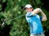 Rainier Ehrhardt / the associated press
Rory McIlroy drives on the third hole at the Honda Classic Friday. He needs to win the tournament to gain world No. 1 ranking.