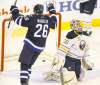 CP
TREVOR HAGAN / THE CANADIAN PRESSWinnipeg Jets winger Blake Wheeler celebrates a first-period goal by Andrew Ladd against Buffalo Sabres goaltender Ryan Miller in Winnipeg Monday night.