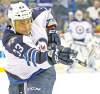 CP
Dustin Byfuglien is third in scoring among all NHL defencemen.