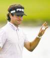 LYNNE SLADKY /  THE ASSOCIATED PRESS
Bubba Watson shows his ball after making eagle on the eighth hole in the second round of the Cadillac Championship Friday at Doral, Fla.