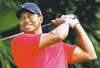 CP
Wilfredo Lee / The Associated PressTiger Woods winces after hitting off the 12th tee at the Cadillac Championship in Doral, Fla. Woods then withdrew from the tournament.