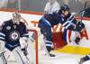 CP
John Woods / the canadian pressGoaltender Ondrej Pavelec keeps a close eye on the action as Jets teammate Mark Stuart checks Capitals� Marcus Johansson to the ice in the first period Friday at the MTS Centre.