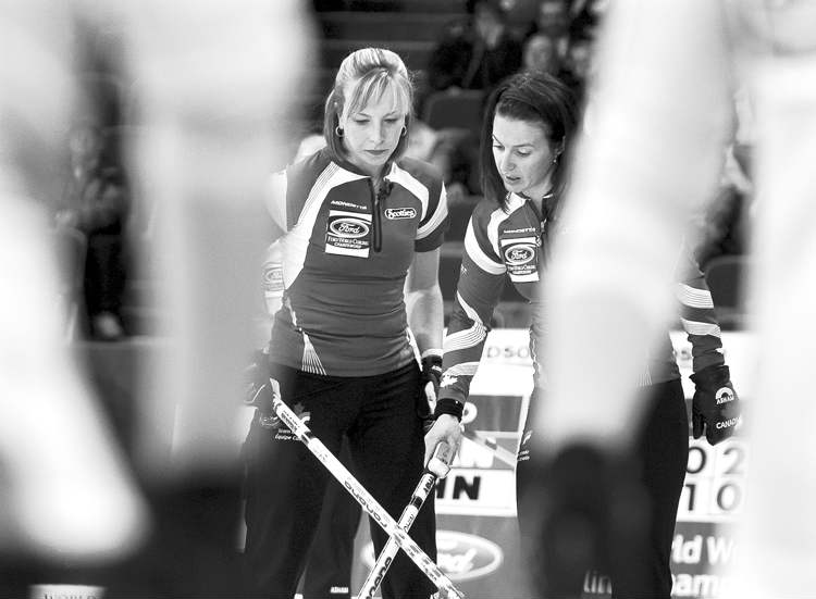 CP
andrew vaughan / the canadian press
Canada�s skip Heather Nedohin, right, and third Beth Iskiw discuss a shot as they play China at the women�s worlds in Lethbridge, Alta., on Sunday.