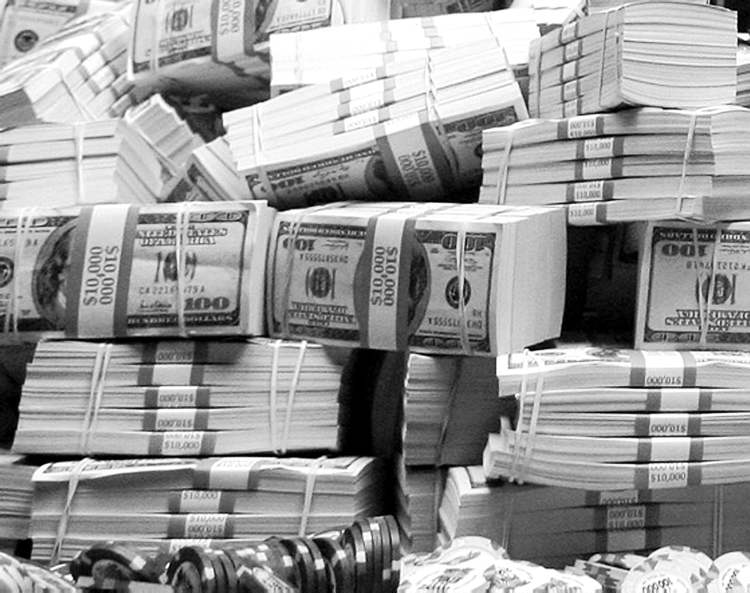 CP
Isaac Brekken / The Associated Press Archives
Peter Eastgate of Denmark poses with a pile of cash after winning the World Series of Poker championship in Las Vegas Nov. 11, 2008. Eastgate won more than $9 million.