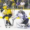 REUTERS
M. J. Masotti Jr. / reuters
The Nashville Predators� Gabriel Bourque (left) scores on Winnipeg Jets goalie Ondrej Pavelec during the second period in Nashville Saturday.