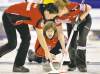 CP
Switzerland�s Carmen Kung, Mirjam Ott and Janine Greiner, left to right, move a stone as they play Sweden in the gold medal game at the Ford World Women�s Curling Championships in Lethbridge, Alta. on Sunday, March 25, 2012. THE CANADIAN PRESS/Andrew Vaughan
