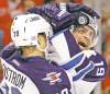 Nam Y. Huh / The Associated Press ARCHIVES
It's been a season to remember on and off the ice for the Jets' Jim Slater, the club's nominee for the Bill Masterton trophy after returning from a serious concussion.