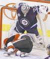 CP
Trevor Hagan / The Canadian Press
ABOVE: Senators winger Kaspars Daugavins slides into Jets goaltender Ondrej Pavelec. BELOW: Bryan Little couldn�t put the puck past Craig Anderson.