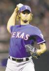 Marcio Jose Sanchez / The Associated Press
Texas Rangers starter Yu Darvish gave up three runs in six innings while  striking out 11 in his last start against the Colorado Rockies.
