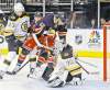 CP
kathy kmonicek / the associated pressNew York Rangers� Artem Anisimov splits Bruins goalie Tim Thomas and teammate Chris Kelly but can�t put the puck away during Sunday action in the Big Apple.