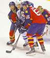 CP
Florida�s Mike Weaver (left) and Ed Jovanovski put the squeeze on Winnipeg�s Antti Miettinen during first-period action in Sunrise, Fla., Tuesday.