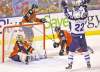 REUTERS
Rhona Wise / REUTERSChris Thorburn and Blake Wheeler celebrate a Jets goal in front of deflated Panthers goaltender Jose Theodore.