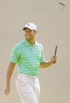 Tribune Media MCT
Golfer Tiger Woods glances back at golfer Sean O�Hair and smiles, after hitting a drive from the 12th tee box during a practice round at Augusta National Golf Club in Augusta, Georgia, Wednesday, April 4, 2012. (Jeff Siner/Charlotte Observer/MCT)