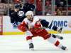 Duane Burleson / The Associated Press
Winnipeg’s Blake Wheeler is tripped up by Detroit blue-liner Niklas Kronwall during third-period action Thursday night.