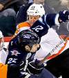 WINNIPEG FREE PRESS
Winnipeg Jets' Chris Thorburn (22) is stopped by Philadelphia Flyers' Wayne Simmonds (17) and Pavel Kubina (13) during third period NHL action in Winnipeg. The Jets hope to end their season on a bang tonight after a disappointing three-loss streak.