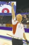 Michael Burns photo
Canadian skip Glenn Howard raises his arm in triumph after defeating Tom Brewster of Scotland in the 1-2 game Saturday.