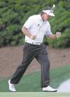 C. Aluka Berry / mct
Phil Mickelson (right) pumps his fist after an eagle putt on the 13th.