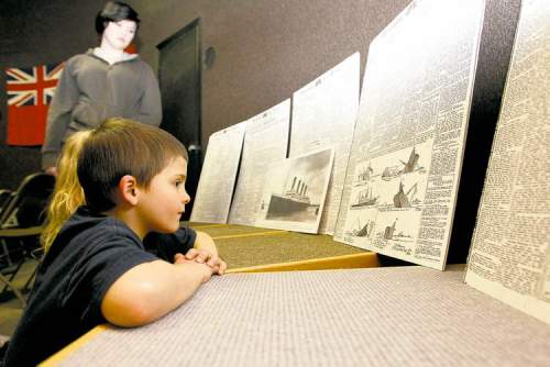 Trevor Hagan / Winnipeg Free Press
Gordon Taylor, 5, looks at copies of the Manitoba Free Press after watching a presentation about the sinking of the Titanic at the Manitoba Museum.