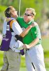 CP
Stephen Morton / The Associated PressCarl Pettersson (right) hugs caddie Grant Berry on the 18th green.