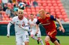 Toronto FC midfielder Alejandro Pozuelo (10) and Real Salt Lake midfielder Kyle Beckerman (5) battle for the ball during the first half of an MLS soccer match Saturday, May 18, 2019, in Sandy, Utah. (AP Photo/Rick Bowmer)
