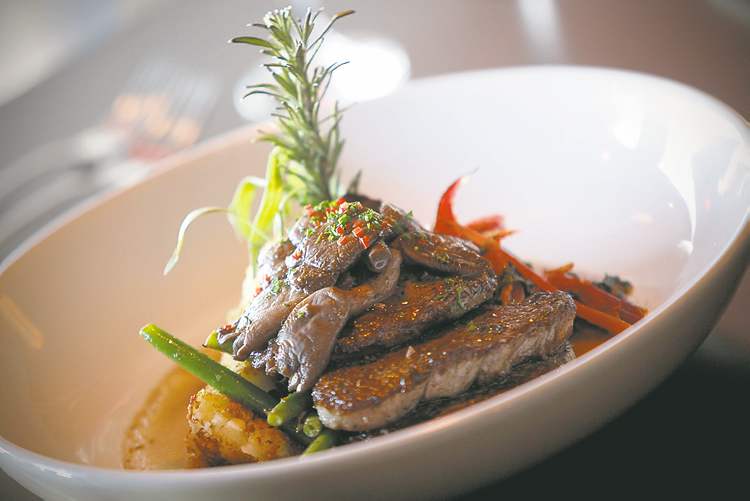 John Woods / Winnipeg Free Press
Medallions of AAA North Ridge Beef Tenderloin served with poached oyster mushrooms and bacon, Reggiano potato croquettes and vegetable of the day at Billabong in Osbourne Village.