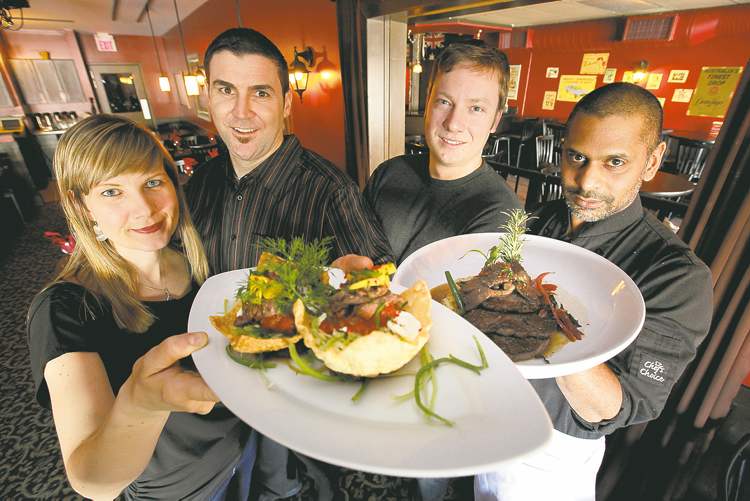 JOHN WOODS / WINNIPEG FREE PRESS
From left, owner Erin and Peter Keating, Owen Degen and executive chef Dave McCall.