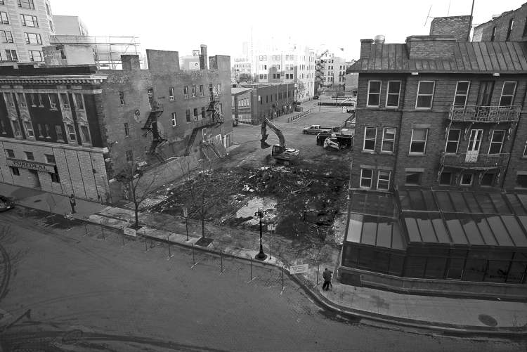 A large hole remains Friday where heritage buildings used to on Albert Street.