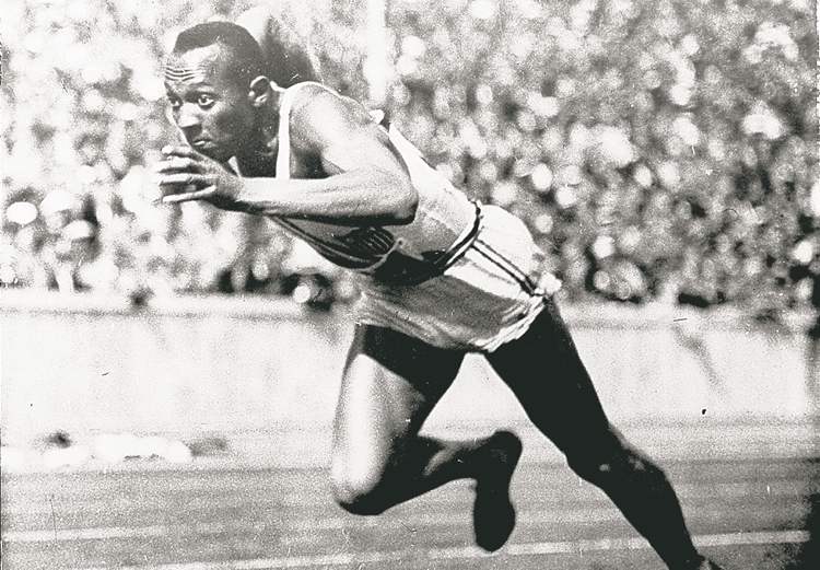 CP
This 1936 file photo shows Owens in action in a 200-metre preliminary heat at the Summer Olympic Games in Berlin.