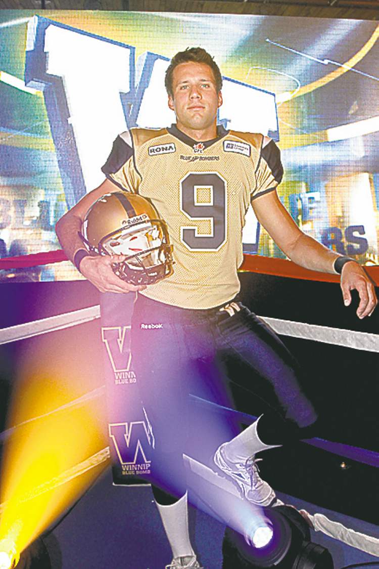 SARAH O. SWENSON / WINNIPEG FREE PRESS
Punter Mike Renaud shows off the new road duds.