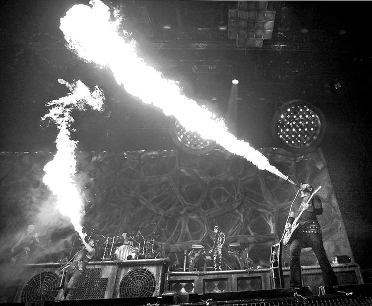 phil hossack / winnipeg free press
Rammstein frontman Till Lindemann (left) and lead guitarist Richard Z. Kruspe spit fire at the MTS Centre Thursday.