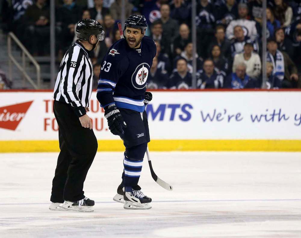 TREVOR HAGAN / FREE PRESS FILES
Jets coach Paul Maurice said after the workout that Dustin Byfuglien will be a game-time decision for Wednesday’s tilt against the Flames.
.