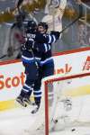 John Woods / The Canadian Press
Winnipeg Jets rookie Scott Kosmachuk celebrates Adam Lowry’s game-winning goal in the third period Saturday night.