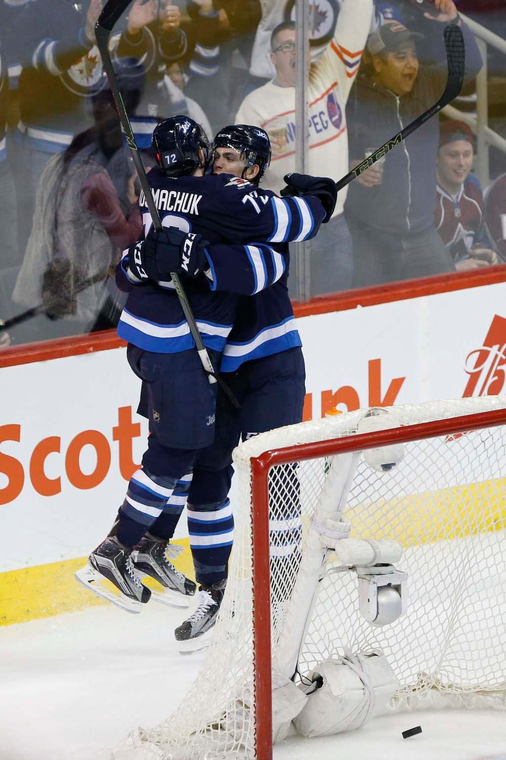 John Woods / The Canadian Press
Winnipeg Jets rookie Scott Kosmachuk celebrates Adam Lowry’s game-winning goal in the third period Saturday night.
