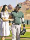 CP
Darron Cummings / the associated press archivesManny Ramirez, seen with his wife Juliana, is already creating a buzz with the River Cats minor-league team.
