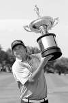 CP
tim sharp / the associated pressJason Dufner holds his prize aloft after winning Byron Nelson on Sunday.