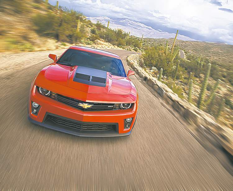 MCT
The 2012 Chevrolet Camaro ZL1 is the best-performing stock Camaro ever.The engine barks like the real McCoy as well. The exhaust system has a cut-out to let all those horses breathe -- as is common these days. But even more mesmerizing is the throttle limiter, which kicks in as you exceed top revs.