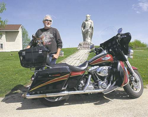 Rusty enjoyed the Ride For Dad, but don't worry, he was only a passenger. He rides in a custom-made tour pack on the back of his owner Brian Boast's Harley-Davidson. Rusty even has a special pair of goggles.