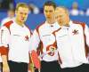 CP
andrew vaughan / the canadian press archivesMark Nichols (from left), Brad Gushue and Russ Howard confer at the 2006 Winter Olympics in Turin, Italy.