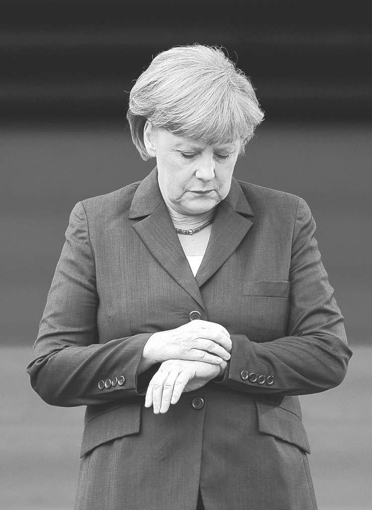 Jens Meyer / The Associated Press Archives
German Chancellor Angela Merkel.