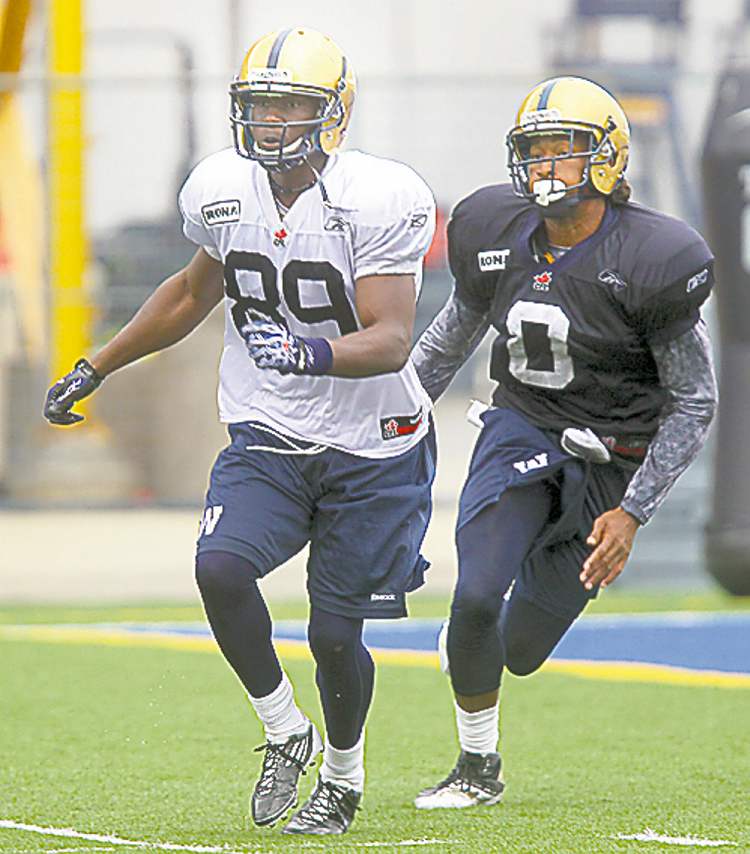Phil Hossack / Winnipeg Free Press
Bombers receiver Clarence Denmark (left) at Friday�s morning workout.