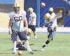 KEN GIGLIOTTI / WINNIPEG FREE PRESS
Justin Palardy drives into a snap from Chris Cvetkovic (50) during a Bombers pre-season workout at Canad Inns Stadium.