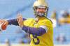 KEN GIGLIOTTI  / WINNIPEG FREE PRESS archives
Quarterback Justin Goltz winds up for a throw at Bombers camp in Canad Inns Stadium. He's competing for a backup job with the club in the regular season.