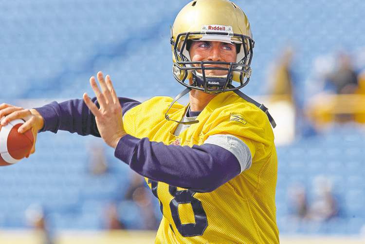 KEN GIGLIOTTI / WINNIPEG FREE PRESS archives
Quarterback Justin Goltz winds up for a throw at Bombers camp in Canad Inns Stadium. He's competing for a backup job with the club in the regular season.