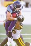 CP
Chris Young / the canadian press
Argos� Chad Kackert (44) is tackled by Ticats� Ike Brown in the first half of their game Wednesday.