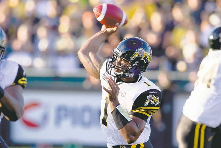 CP
Chris Young / the canadian press
Tiger-Cats quarterback Henry Burris winds up to throw in a pre-season game against the Toronto Argonauts in Hamilton on Wednesday night.