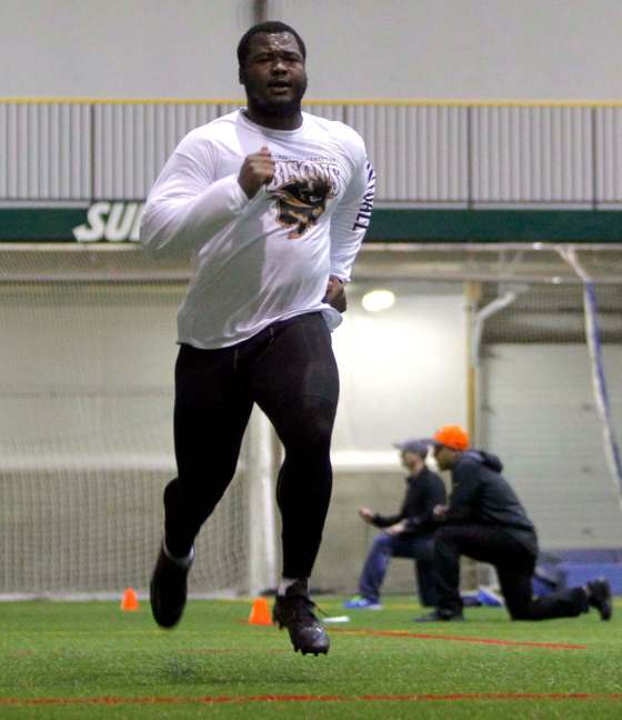 BORIS MINKEVICH / WINNIPEG FREE PRESSManitoba Bisons defensive tackle David Onyemata shows off his skills for pro scouts at the first NFL Pro Day ever held in Winnipeg.
